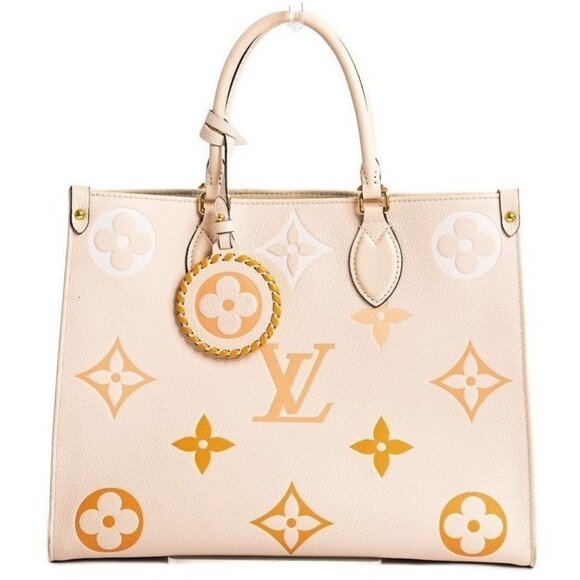 Louis Vuitton Handbags - Authentic Louis Vuitton On The Go Tote Empreinte By The Pool Onthego MM Cream
